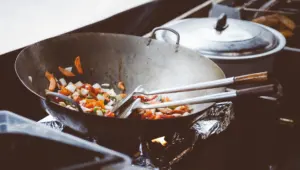 Vegetables stir-frying in a wok