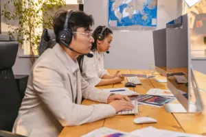 A customer support agent wearing a headset